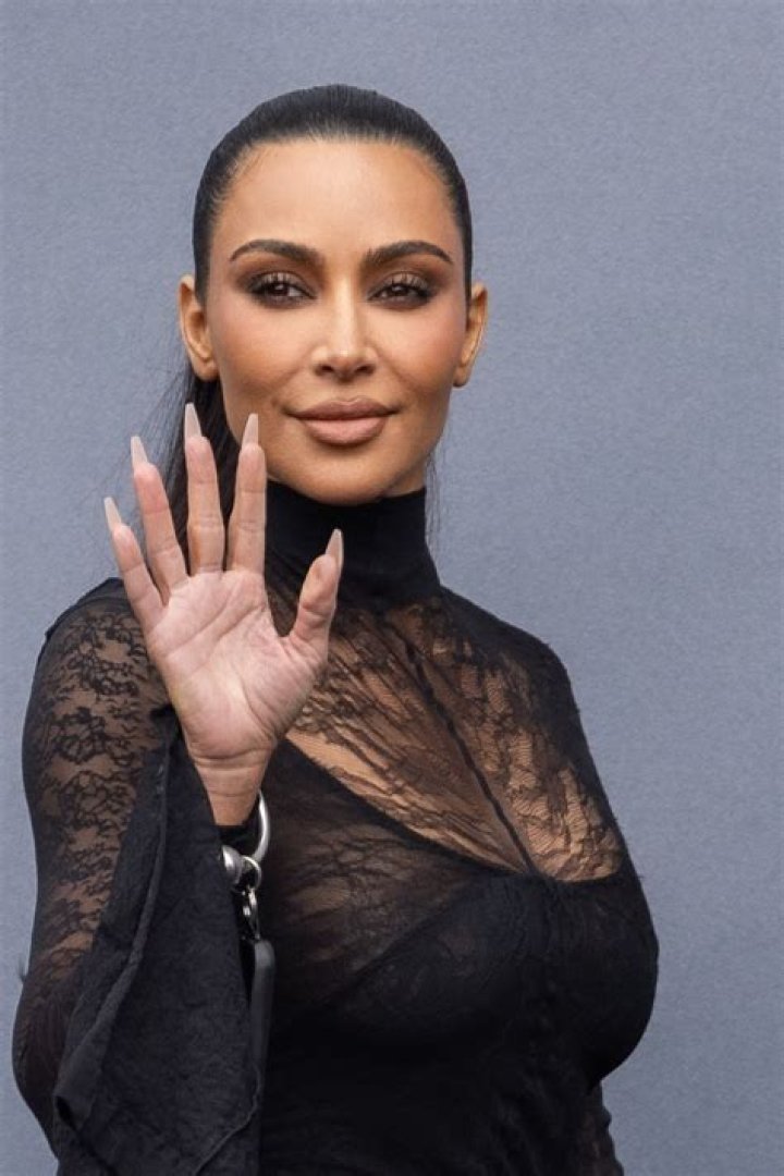 
Kim Kardashian Shows Off Her Natural Shoulder-Length Hair in Viral Holiday TikTok 